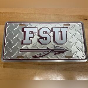 SOLD-Florida State University Seminoles Metal License Plate. FSU Spear Diamond.